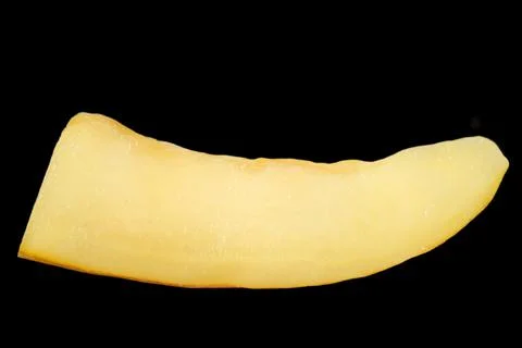 Melon piece isolate on black background. yellow ripe yellow melon. Foto stock