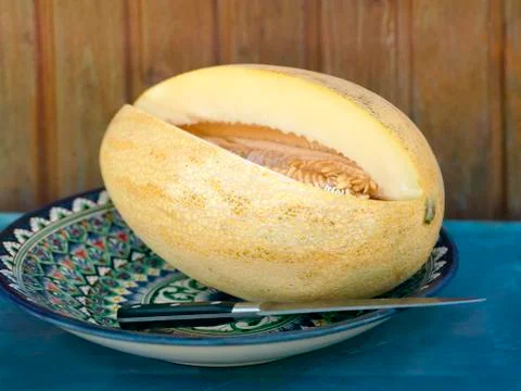 Melon On Plate Фото
