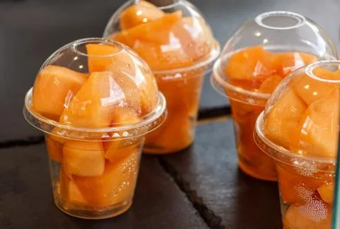 Melon portion. Fresh ripe melon honeydew pieces in a glass bowl . Foto stock