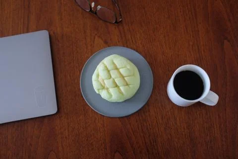 Melon Ppang, a fluffy Korean bread shaped like a melon with a crisp, sugary.. Foto stock