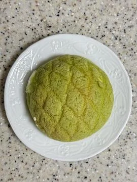 Melon Ppang, a fluffy Korean bread shaped like a melon with a crisp, sugary.. Stock Photos