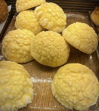 Melon Ppang, a fluffy Korean bread shaped like a melon with a crisp, sugary.. Stock Photos