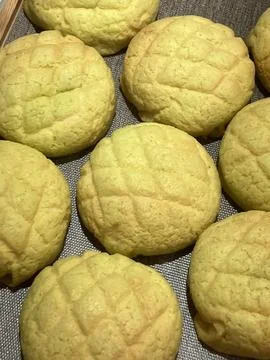 Melon Ppang, a fluffy Korean bread shaped like a melon with a crisp, sugary.. Stock Photos