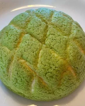 Melon Ppang, a fluffy Korean bread shaped like a melon with a crisp, sugary.. Stock Photos