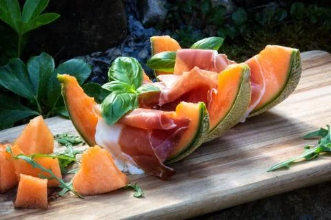 Melon with the prosciutto Фото