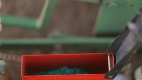 Melon Seeds in Tractor Dispensor Stock Footage 94688622