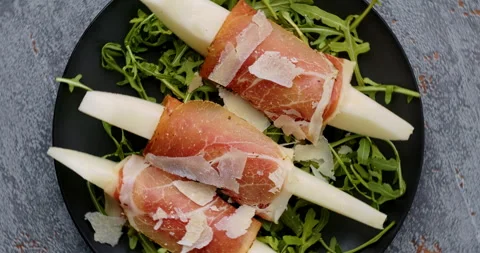 Melon with serrano ham snack. Stock Footage 278242943
