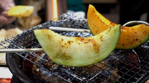 Melon skewer grilled was appetizing Stock Footage 84927556