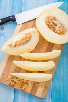 Melon slices on a cutting board Stock Photos