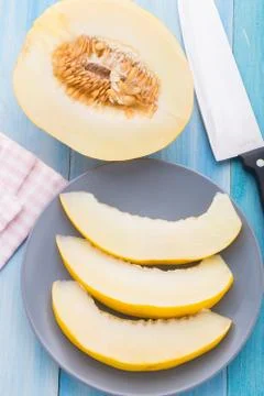 Melon slices on a plate Stock Photos
