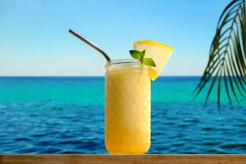 Melon smoothie decorated mint leaf. Tropical beach bar. Stock Photos