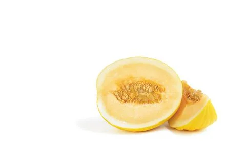 Melon on a white background. Yellow melon on a white isolate. Fresh juicy piece Stock Photos