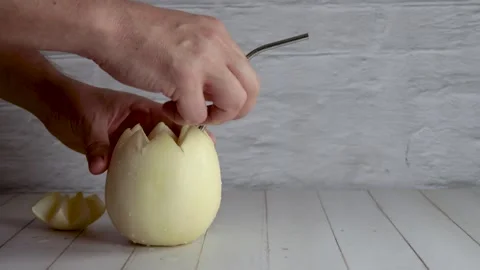 Melon with wine, melvin white, video, preparing, cocktail, place, straw. On w Stock Footage 258414626