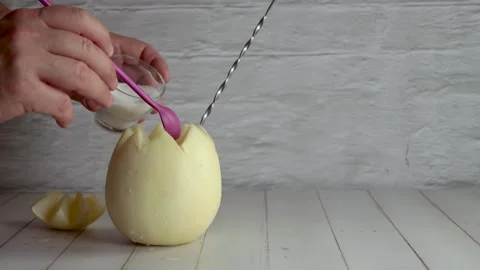 Melon with wine, white melvin, video, preparing, cocktail, adding, sugar. On  Stock Footage 258414633