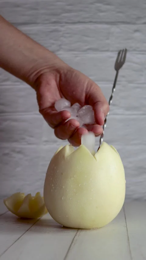 Melon with wine, white melvin, video, preparing, cocktail, adding, ice. On wh Stock Footage 258414688