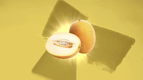 Melon on a yellow background. Rays of light. Stock Footage 217994780
