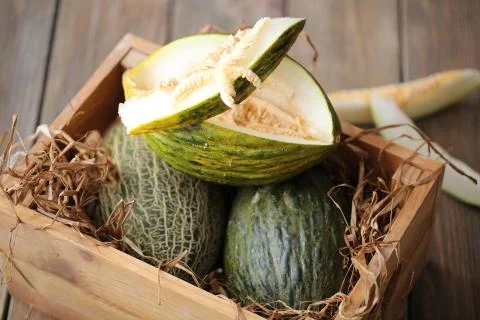Melons in the crate Stock Photos