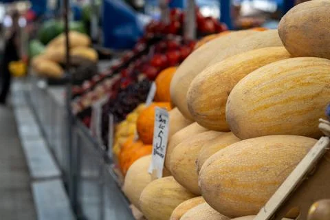 Melons on a market stall. Stock Photos