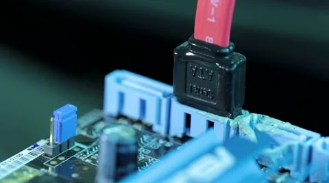 Melt SATA (Serial ATA) cable connected Into The Motherboard. Macro shot. 스톡 동영상 46052723