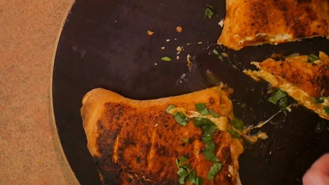 Melted cheese appetizing flows from pizza. Traditional cuisine. Мan or a woman Stock Footage 106043042