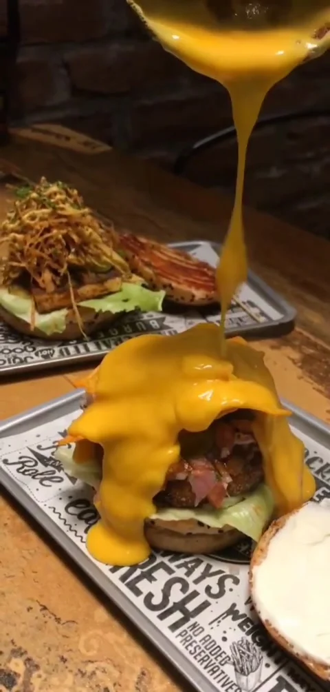 Melted cheese on Hamburger Stock Footage 139003621