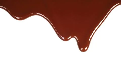 Melted chocolate dripping . Stock Photos