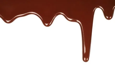 Melted chocolate dripping . Stock Photos