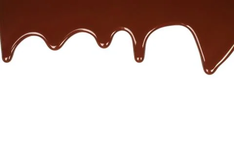 Melted chocolate dripping . Stock Photos