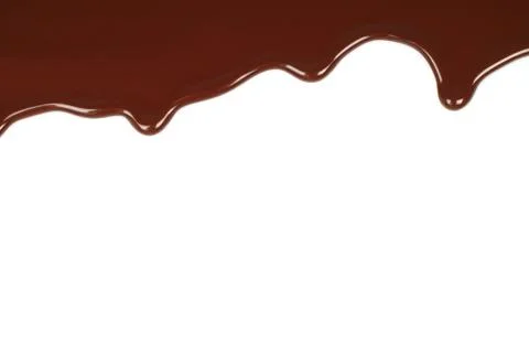 Melted chocolate dripping . Stock Photos