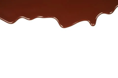 Melted chocolate dripping . Stock Photos
