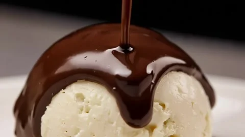 Melted Chocolate Dripping on Vanilla Dessert Stock Footage 339755926