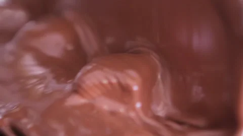 Melted chocolate over marzipan Stock Footage 25847710