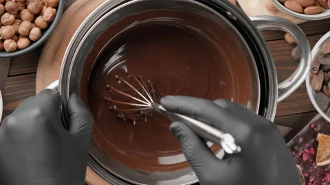 Melted chocolate preparation, top view Stock Footage 145018581