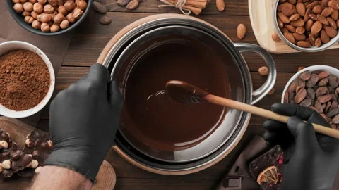 Melted chocolate preparation, top view Stock Footage 145050705