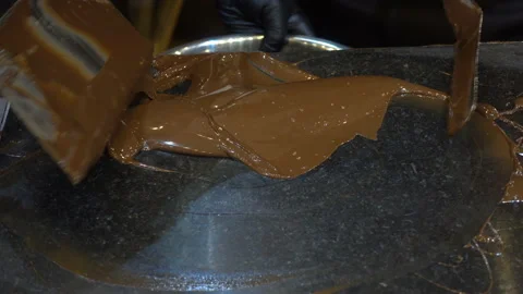 Melted chocolate with spatulas in 4K Stock Footage 150724121
