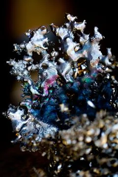 Melted Colorful Titanium  Stock Photos