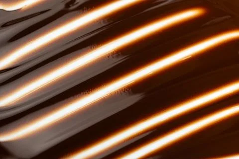 Melted Dark Chocolate Texture Macro Top View. Stock Photos