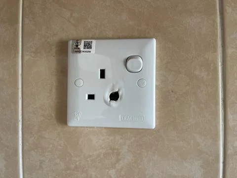 Melted Electric Wall Socket Switch Damaged By Short Circuit Stock Photos