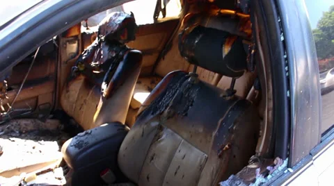 Melted interior of a burnt car 스톡 동영상 32113996
