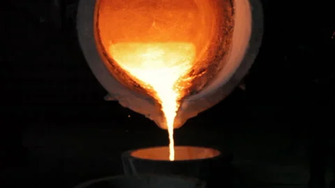 Melted metal drops off from a ladle Stock Footage 231497161