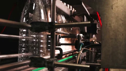 Melted milk is poured into an empty container at the factory Stock Footage 170667827