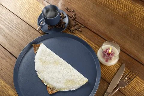 Melted mozzarella cheese tapioca, next to a cup of black coffee. Traditiona.. Stock Photos