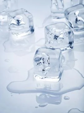 Melted pieces of ice on a white background Stock Photos