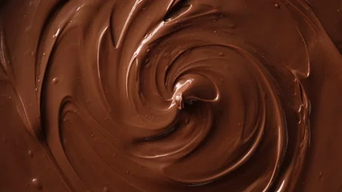 Melted premium chocolate top view rotating Stock-Footage 138925251