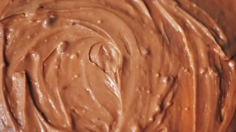Melted premium chocolate top view rotating, Confectionery concept Stock Footage 221675635