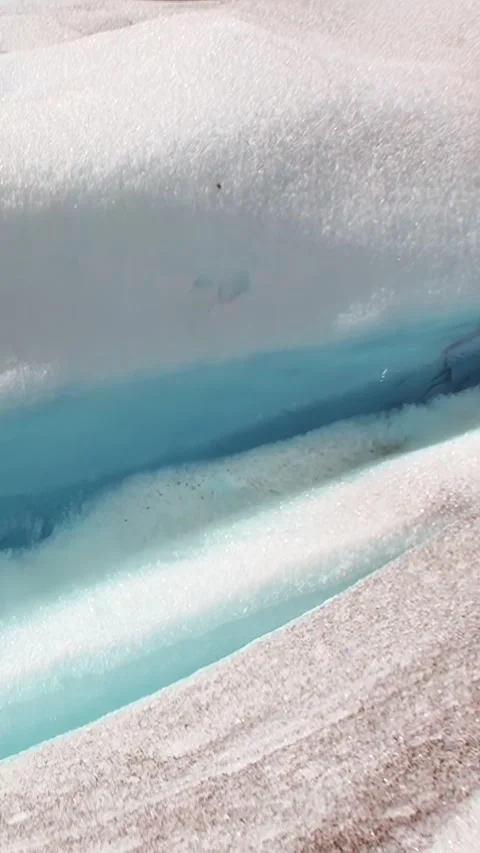 Melted rivers flow through the glaciers of Patagonia in the Andes, Argentina Stock Footage 289805411
