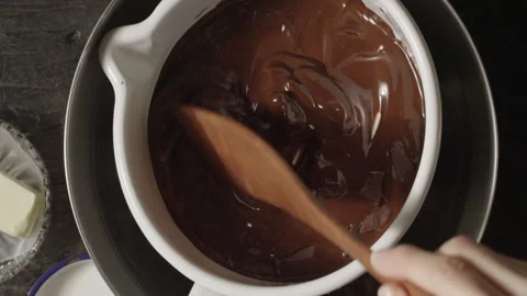 Melting and Mixing Chocolate Stock Footage 332520470