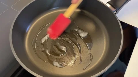 Melting butter for cooking 스톡 동영상 342335517