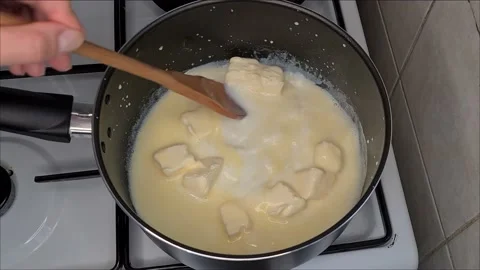Melting Butter in Milk Stock Footage 171750955