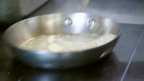 Melting butter in the pan 스톡 동영상 104663636